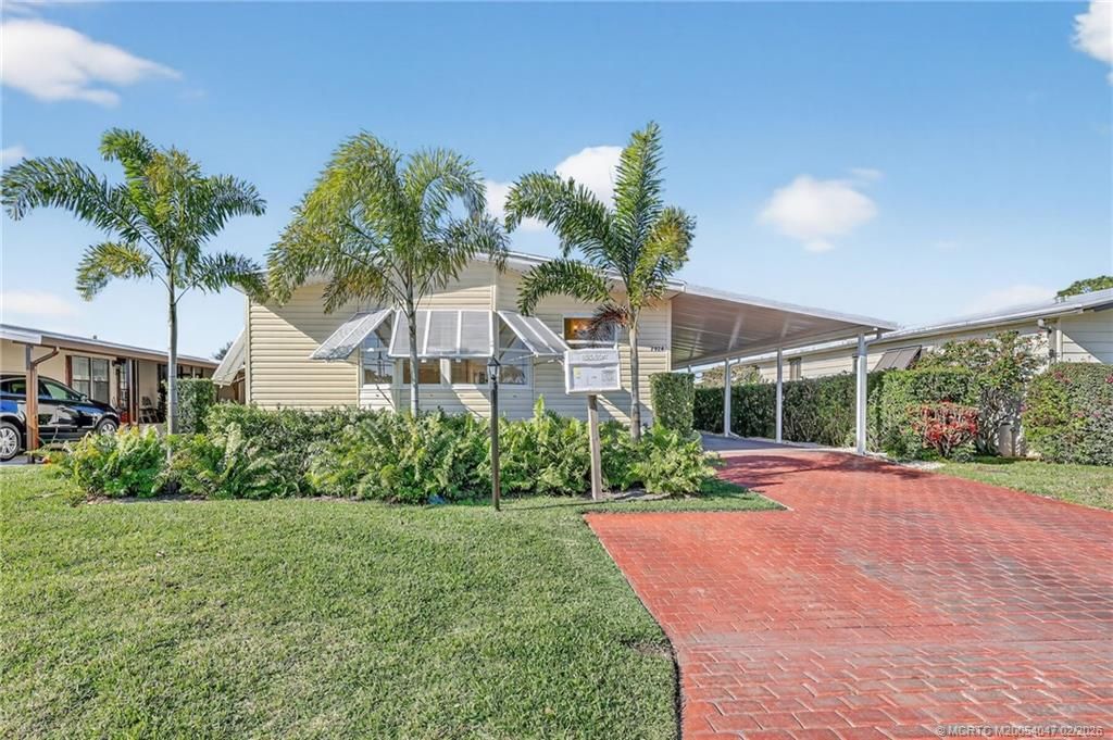 Photo of 7924 SE Saratoga Drive, Hobe Sound, FL 33455 (MLS # M20054047)