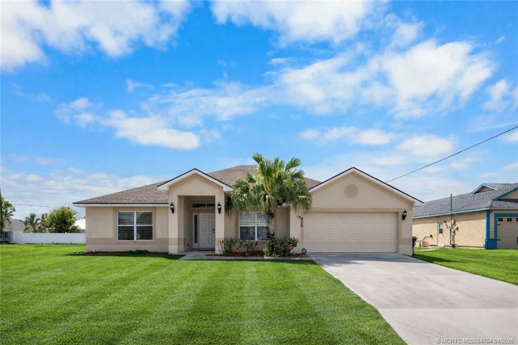 Photo of 870 SW Mccoy Avenue, Port Saint Lucie, FL 34953 (MLS # M20054764)