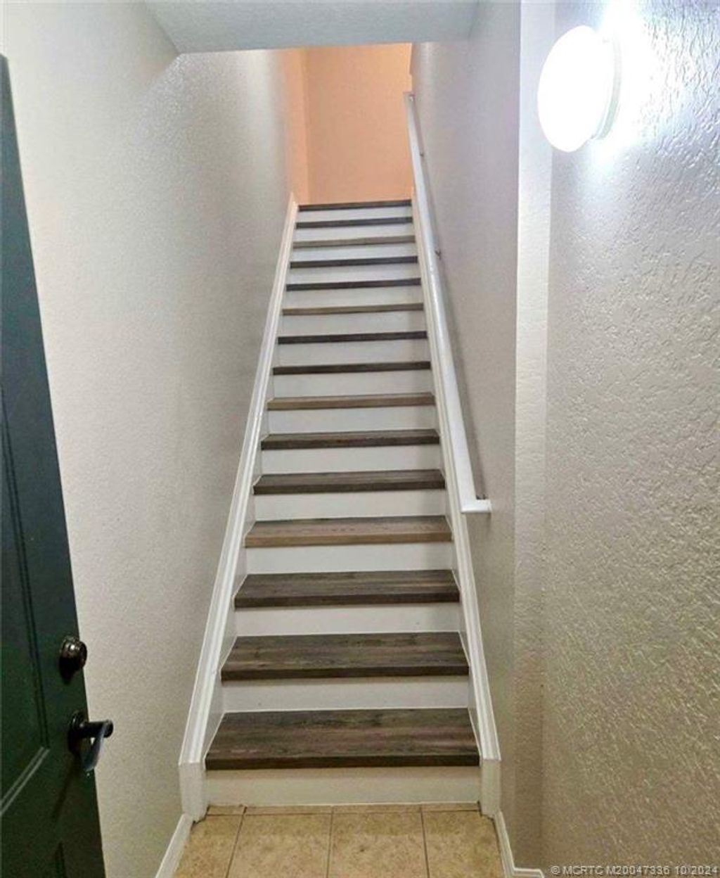 Photo of 158 SW Peacock Boulevard #30-202, Port Saint Lucie, FL 34986 (MLS # M20047336)