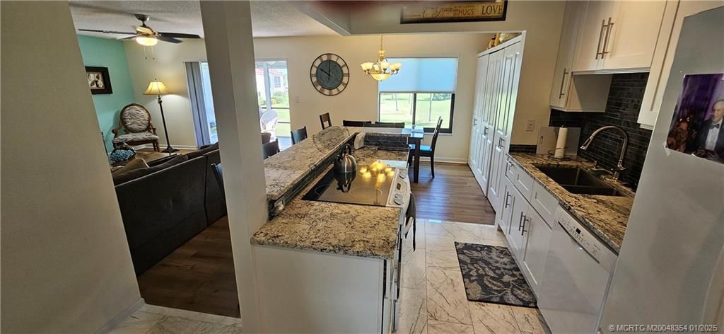 Photo of 5463 SE Miles Grant Road #B-203, Stuart, FL 34997 (MLS # M20048354)