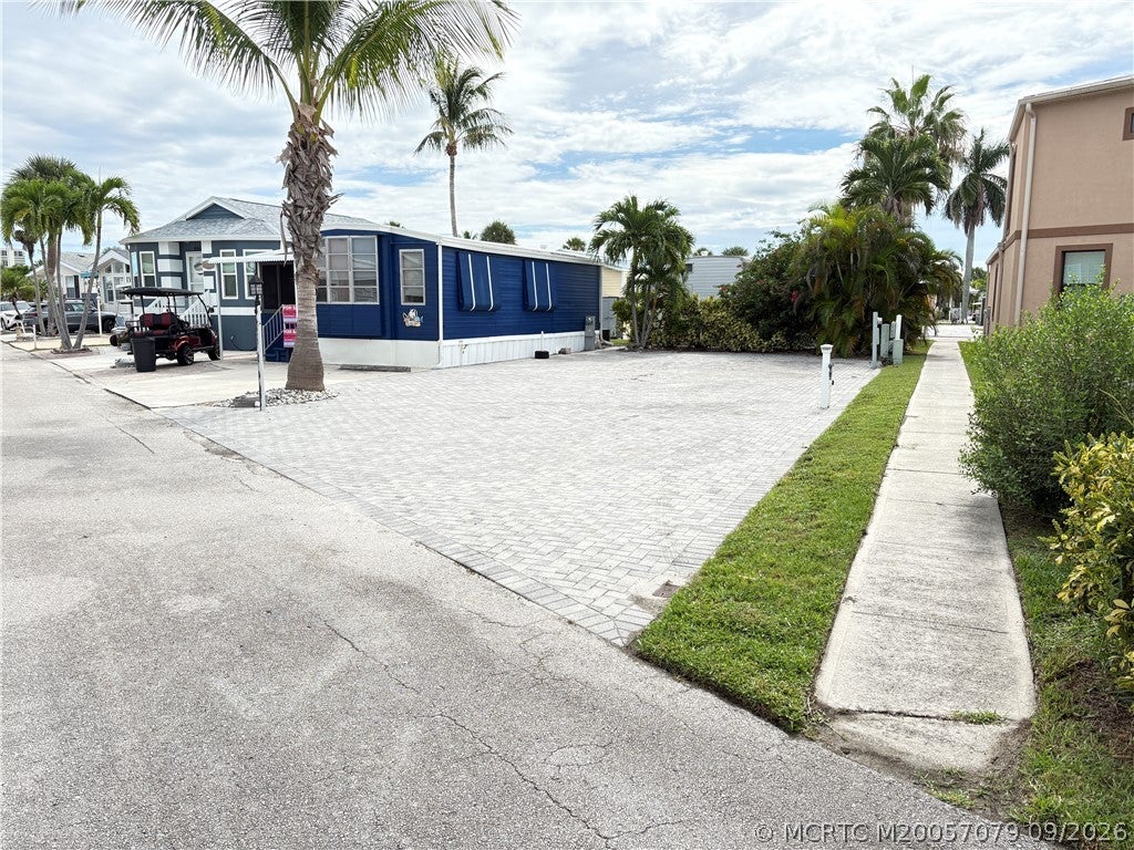 Photo of 549 Nettles Boulevard, Jensen Beach, FL 34957 (MLS # M20057079)
