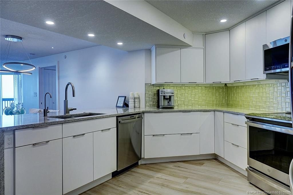 Photo of 8880 S Ocean Drive #405, Jensen Beach, FL 34957 (MLS # M20048550)