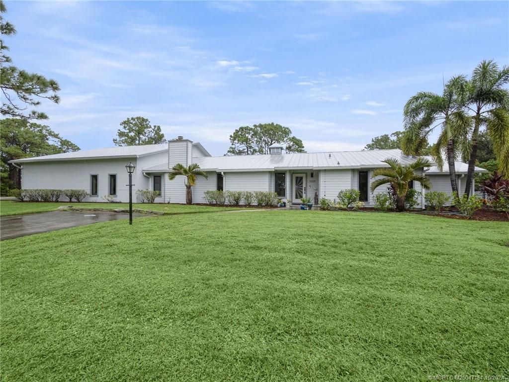 Photo of 5505 SE Martin Meadows Avenue, Stuart, FL 34997 (MLS # M20047161)