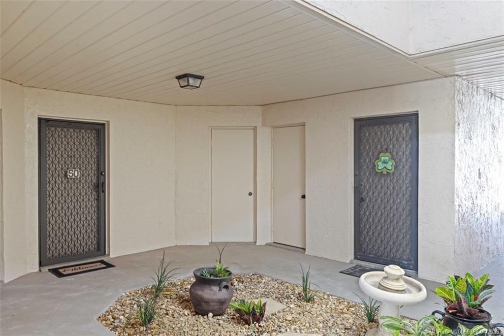 Photo of 1943 NE Collins Circle #50, Jensen Beach, FL 34957 (MLS # M20055358)