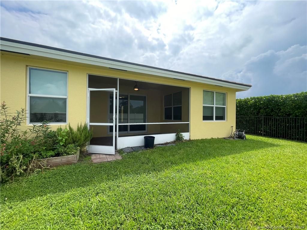 Photo of 480 NW Windflower Terrace, Jensen Beach, FL 34957 (MLS # M20055201)