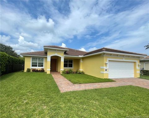 Photo of 480 NW Windflower Terrace, Jensen Beach, FL 34957 (MLS # M20055201)