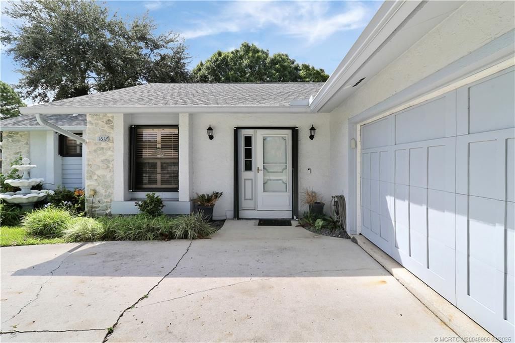 Photo of 1612 SE Grapeland Avenue, Port Saint Lucie, FL 34952 (MLS # M20048906)