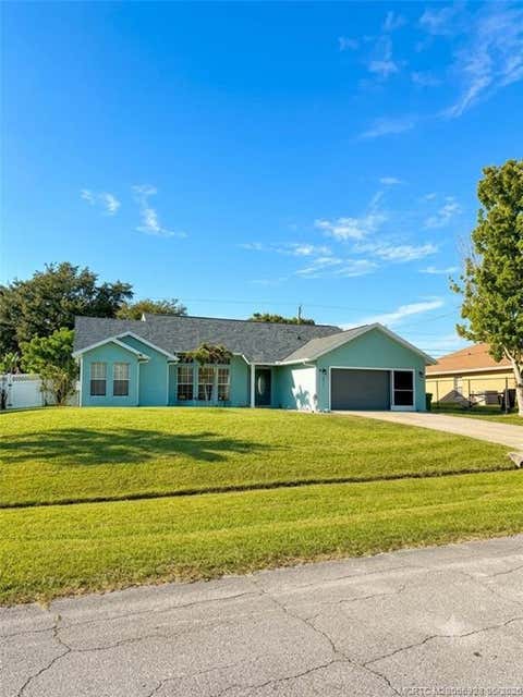 Photo of 2510 SW Fair Isle Road, Port Saint Lucie, FL 34987 (MLS # M20055928)
