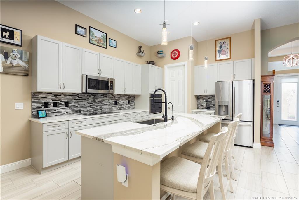 9294 SW Miracoli Way