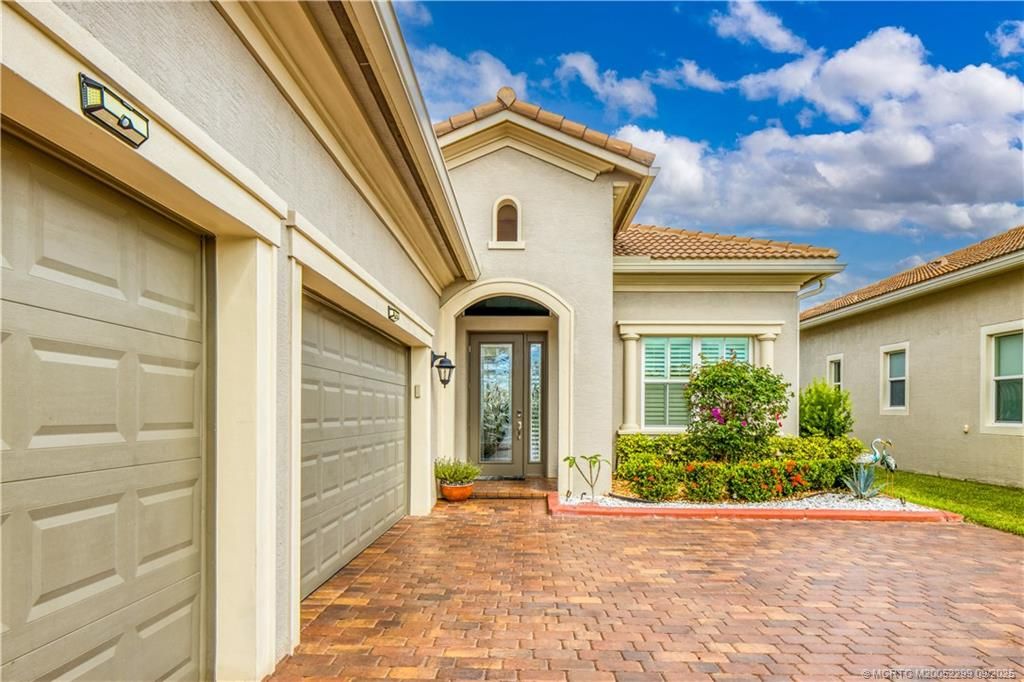 Photo of 9294 SW Miracoli Way, Port Saint Lucie, FL 34987 (MLS # M20052299)