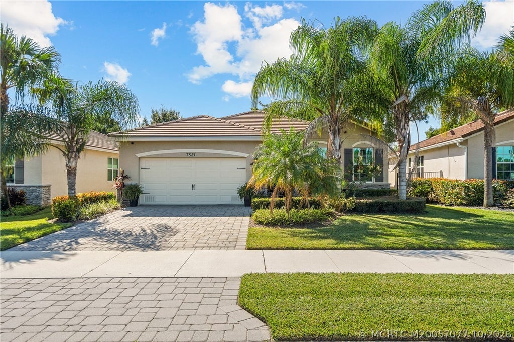 Photo of 7521 SW Harbor Cove Drive, Stuart, FL 34997 (MLS # M20057077)