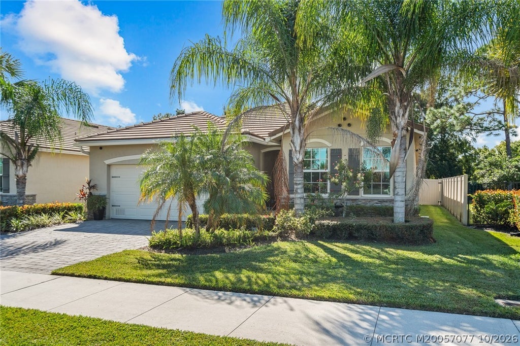Photo of 7521 SW Harbor Cove Drive, Stuart, FL 34997 (MLS # M20057077)