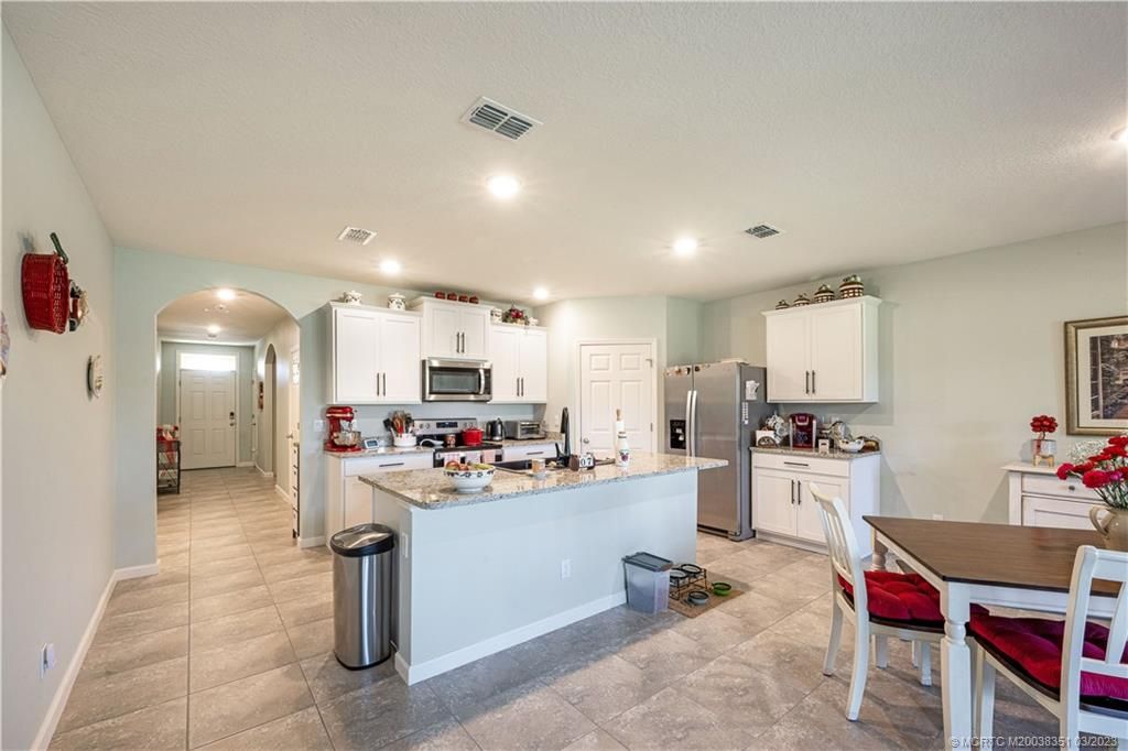 Photo of 6368 NW Northwood Loop, Port Saint Lucie, FL 34983 (MLS # M20038351)