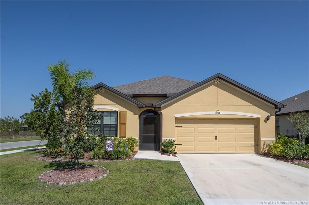 Photo of 6368 NW Northwood Loop, Port Saint Lucie, FL 34983 (MLS # M20038351)