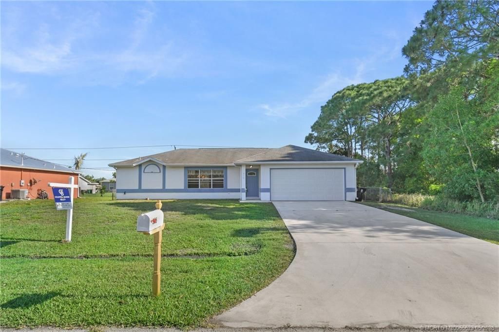Photo of 316 SW Todd Avenue, Port Saint Lucie, FL 34983 (MLS # M20055623)