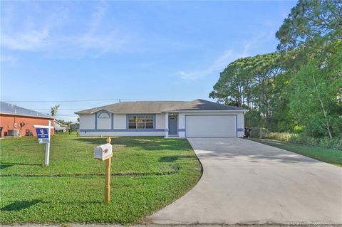 Photo of 316 SW Todd Avenue, Port Saint Lucie, FL 34983 (MLS # M20055623)