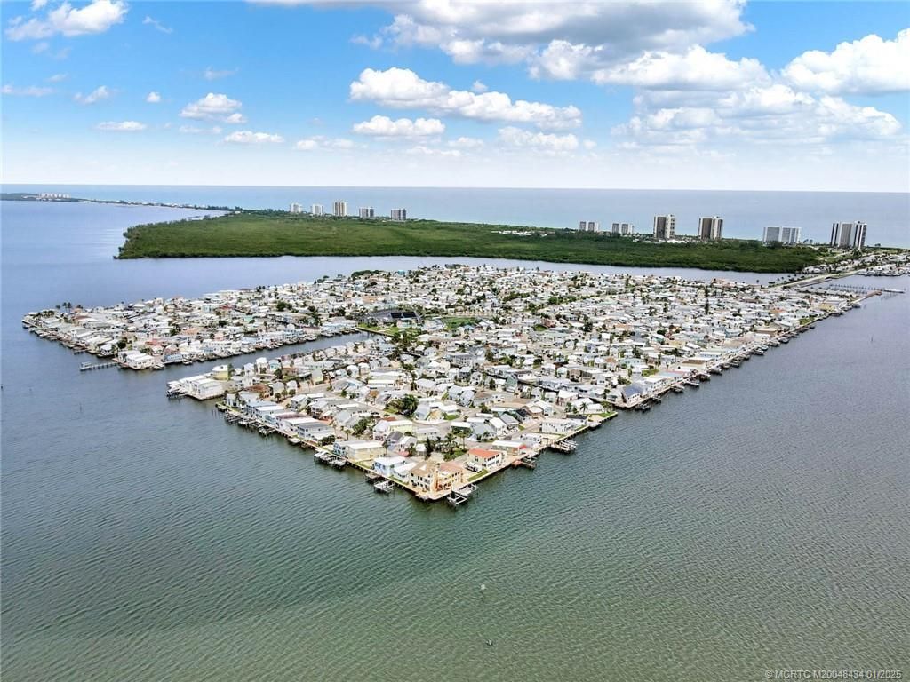 Photo of 828 Nettles Boulevard, Jensen Beach, FL 34957 (MLS # M20048434)