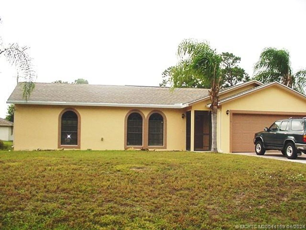 Photo of 3950 SW Bamberg Street SW, Port Saint Lucie, FL 34953 (MLS # M20044159)