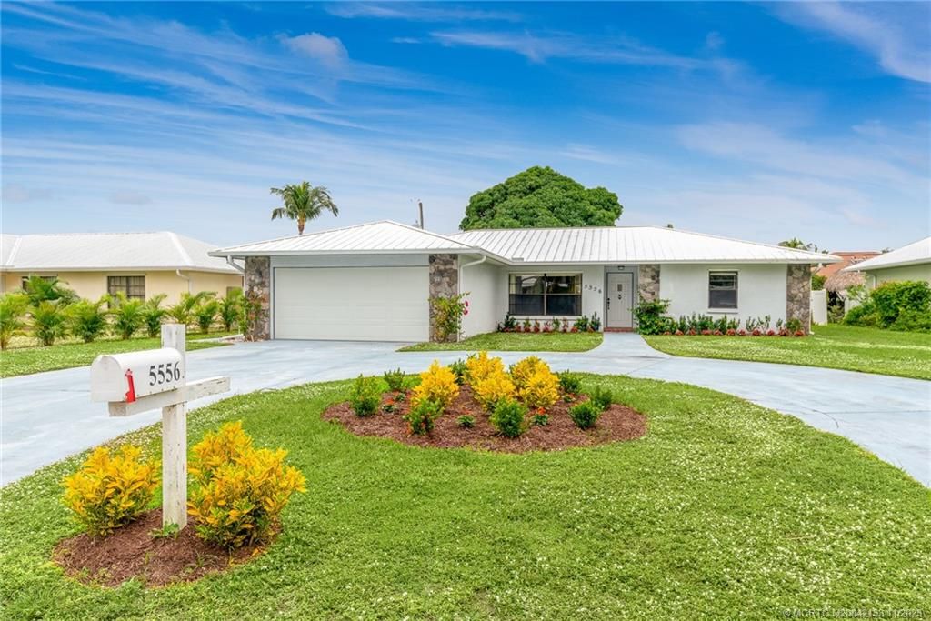 Photo of 5556 SE Matousek Street, Stuart, FL 34997 (MLS # M20042133)