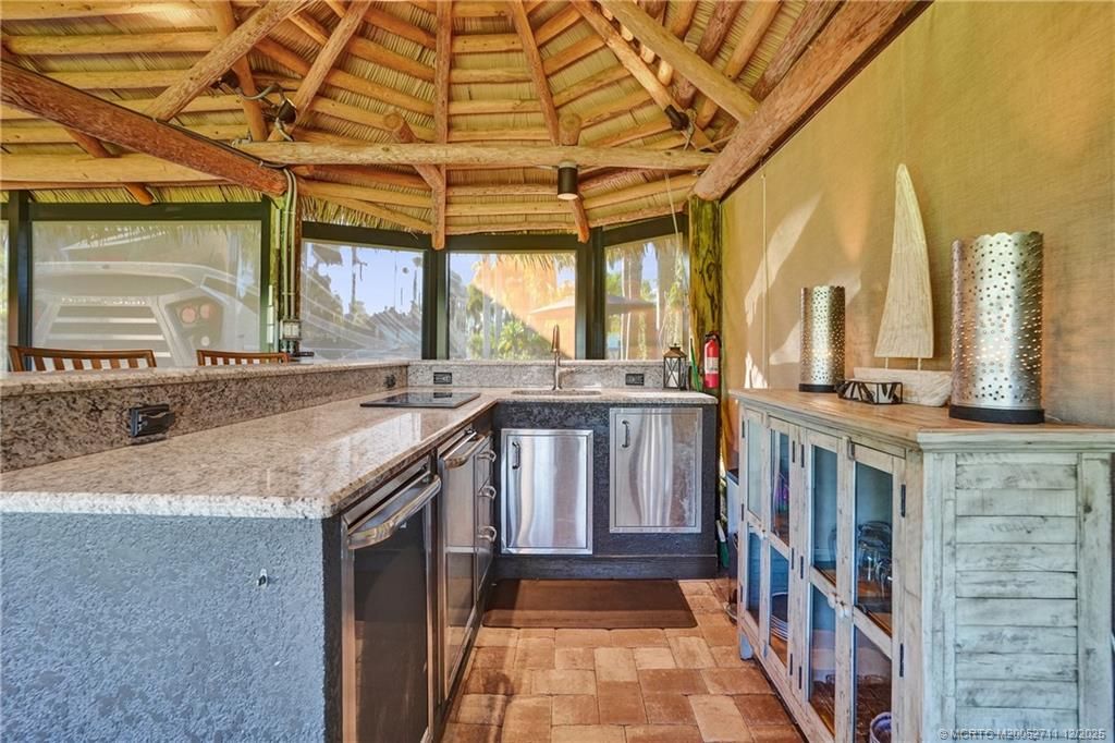 Photo of 450 NW Sandtrap Lane, Port Saint Lucie, FL 34986 (MLS # M20052711)