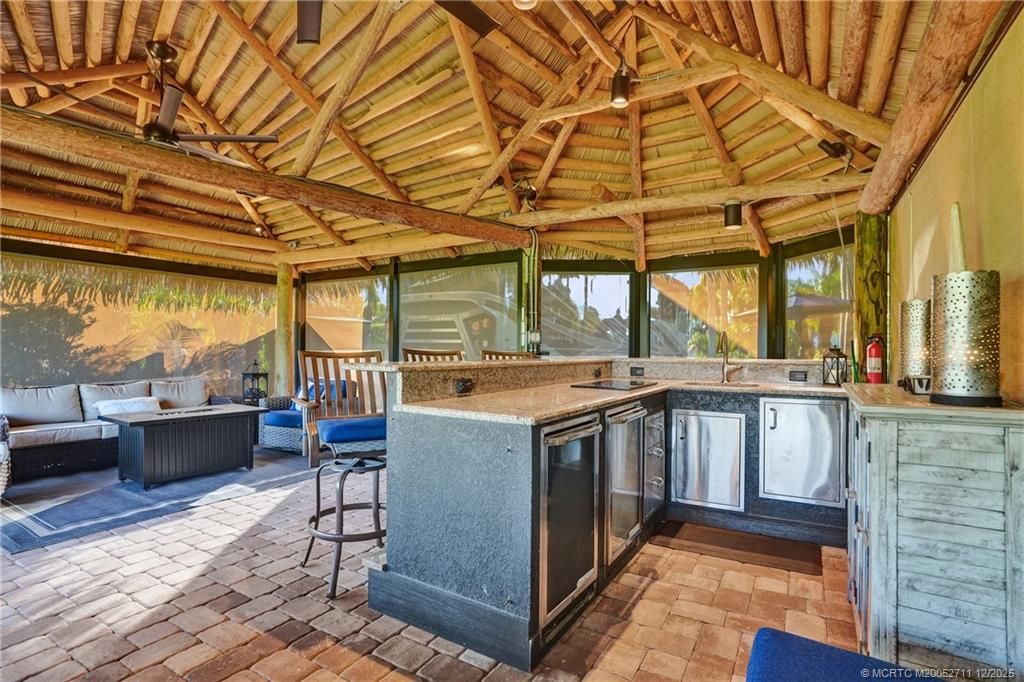 Photo of 450 NW Sandtrap Lane, Port Saint Lucie, FL 34986 (MLS # M20052711)