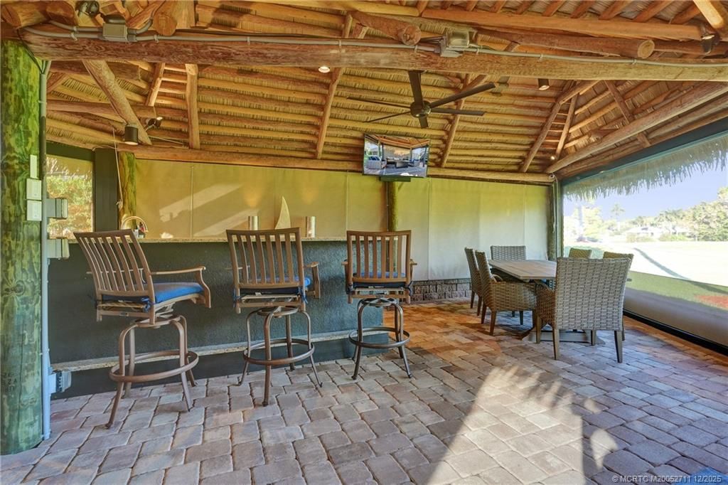 Photo of 450 NW Sandtrap Lane, Port Saint Lucie, FL 34986 (MLS # M20052711)