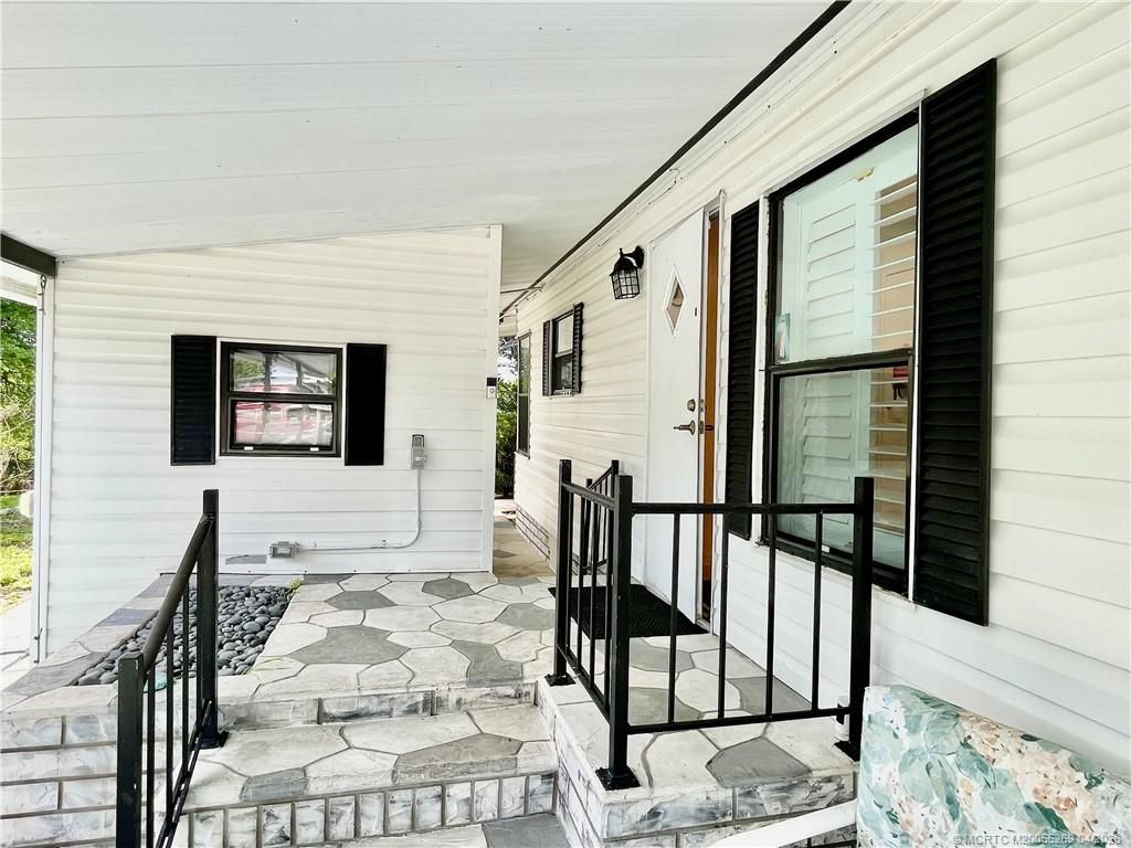 Photo of 14521 SW Divot Drive, Indiantown, FL 34956 (MLS # M20055269)