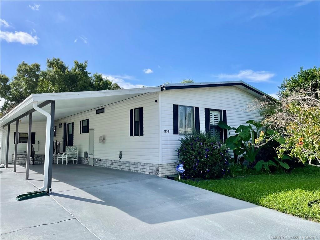 Photo of 14521 SW Divot Drive, Indiantown, FL 34956 (MLS # M20055269)