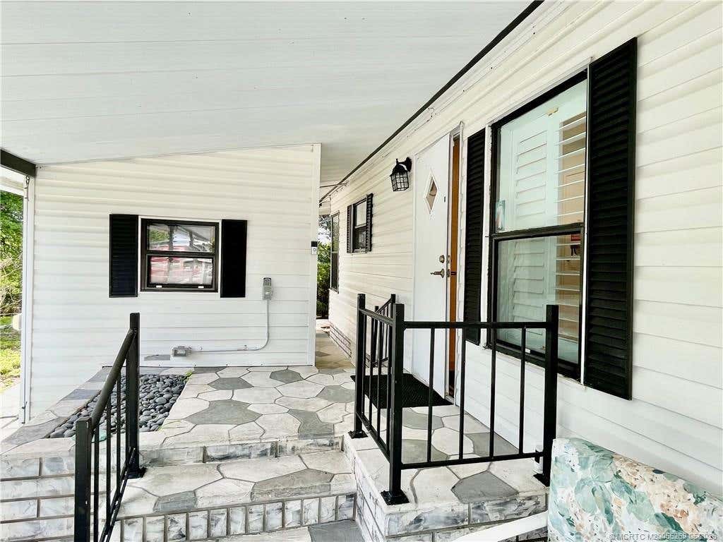 Photo of 14521 SW Divot Drive, Indiantown, FL 34956 (MLS # M20055269)