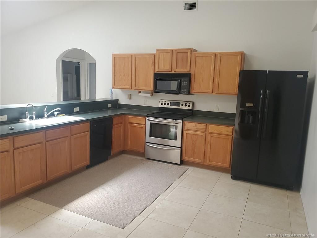 Photo of 781 NW Grenada Street, Port Saint Lucie, FL 34983 (MLS # M20044609)