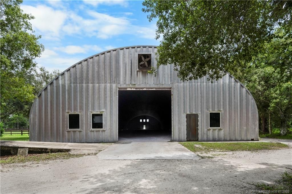 Photo of 5478 SW Ludlum Street, Palm City, FL 34990 (MLS # M20051432)