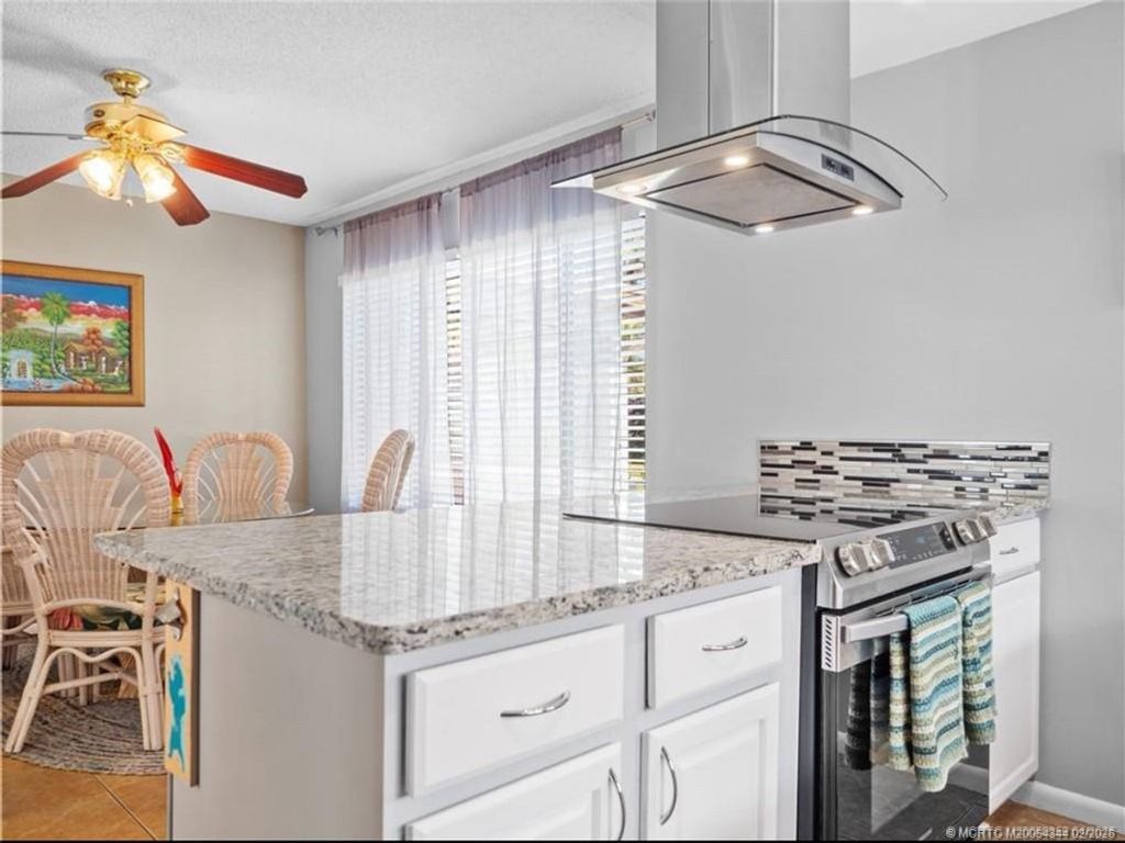 Photo of 950 S Kanner Highway #TH138, Stuart, FL 34994 (MLS # M20054344)