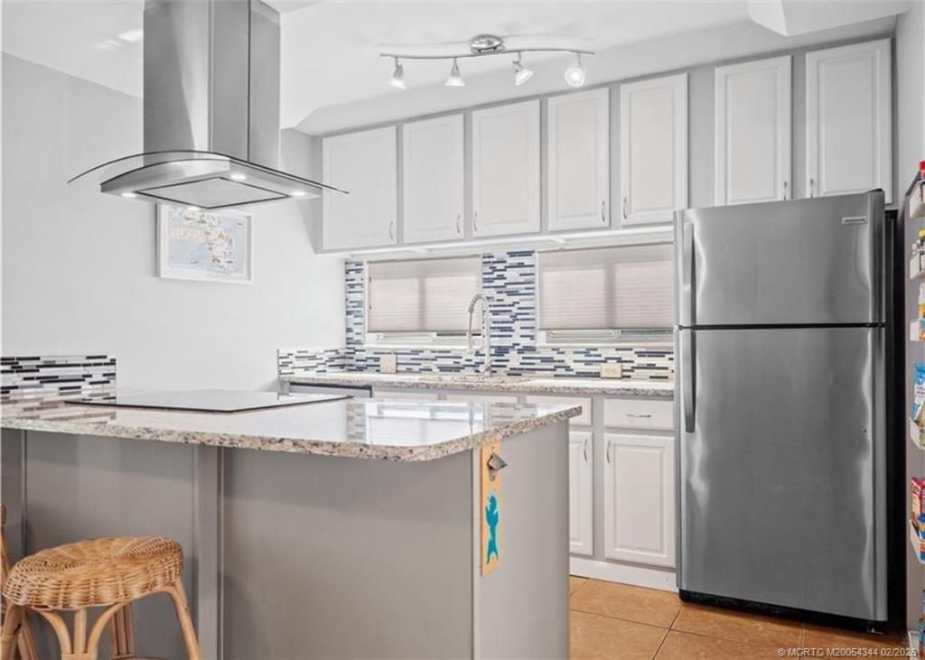 Photo of 950 S Kanner Highway #TH138, Stuart, FL 34994 (MLS # M20054344)