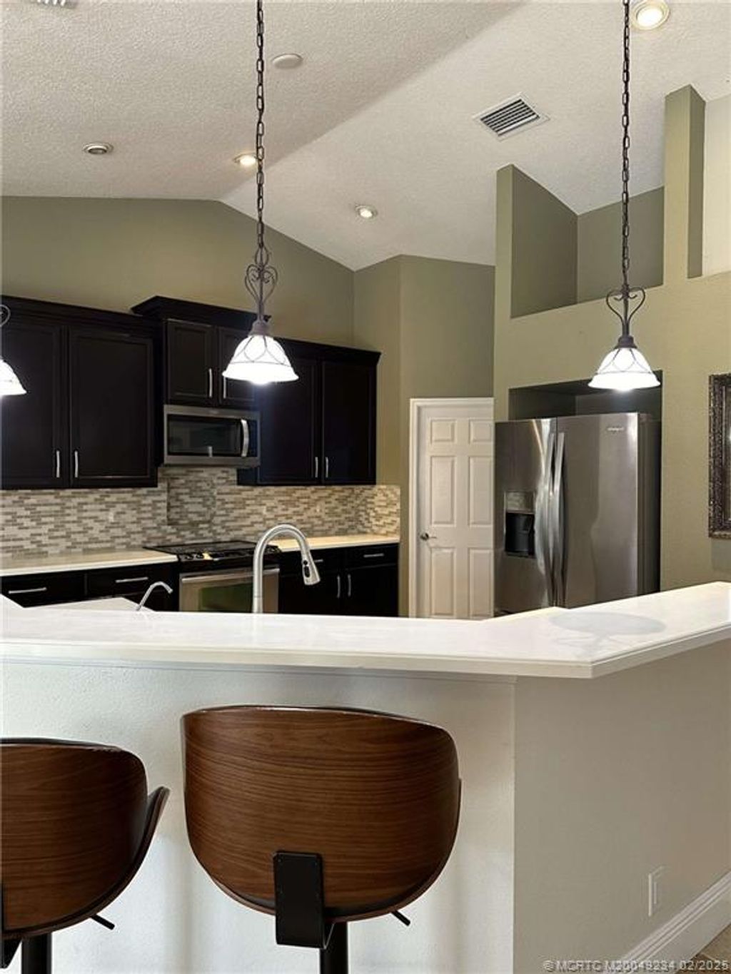 Photo of 1054 SW Idol Avenue, Port Saint Lucie, FL 34953 (MLS # M20049234)