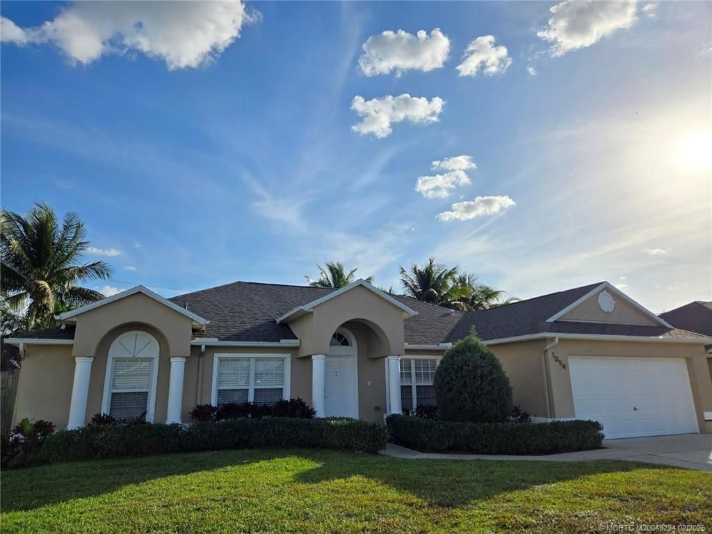 Photo of 1054 SW Idol Avenue, Port Saint Lucie, FL 34953 (MLS # M20049234)