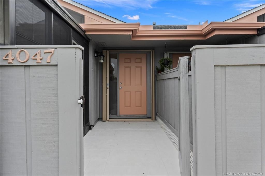 Photo of 4047 NW Cinnamon Tree Circle, Jensen Beach, FL 34957 (MLS # M20053979)