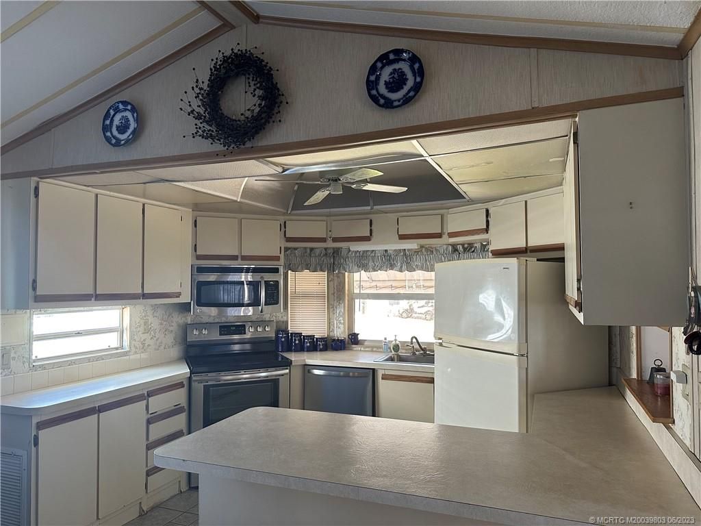 Photo of 102 Nettles Boulevard, Jensen Beach, FL 34957 (MLS # M20039803)