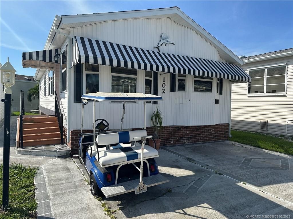 Photo of 102 Nettles Boulevard, Jensen Beach, FL 34957 (MLS # M20039803)