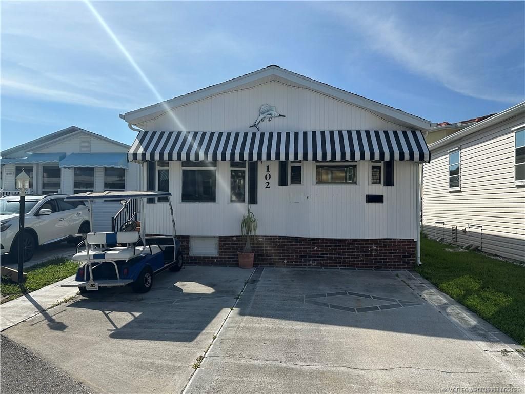 Photo of 102 Nettles Boulevard, Jensen Beach, FL 34957 (MLS # M20039803)