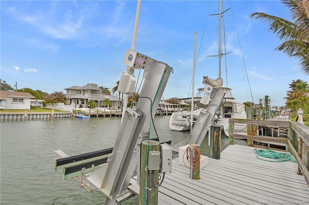 Photo of 2550 Harbour Cove Drive, Hutchinson Island, FL 34949 (MLS # M20054836)