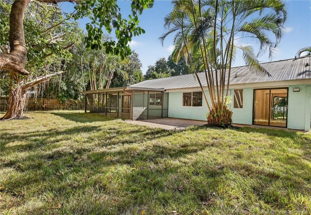 Photo of 2041 SE Giffen Avenue, Port Saint Lucie, FL 34952 (MLS # M20053253)