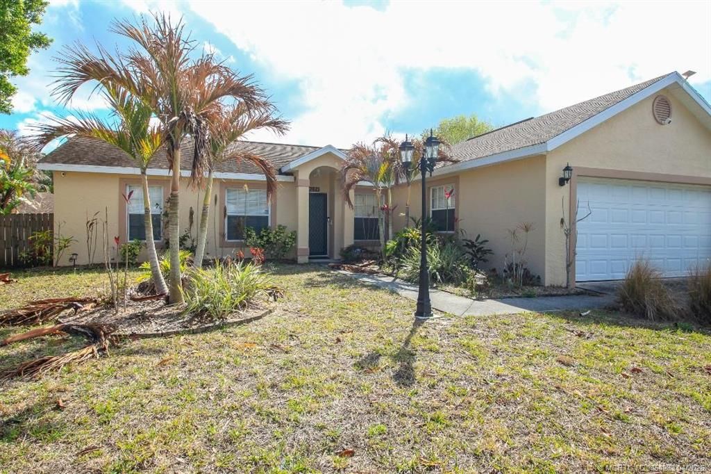 Photo of 2274 SE Longhorn Avenue, Port Saint Lucie, FL 34952 (MLS # M20054983)