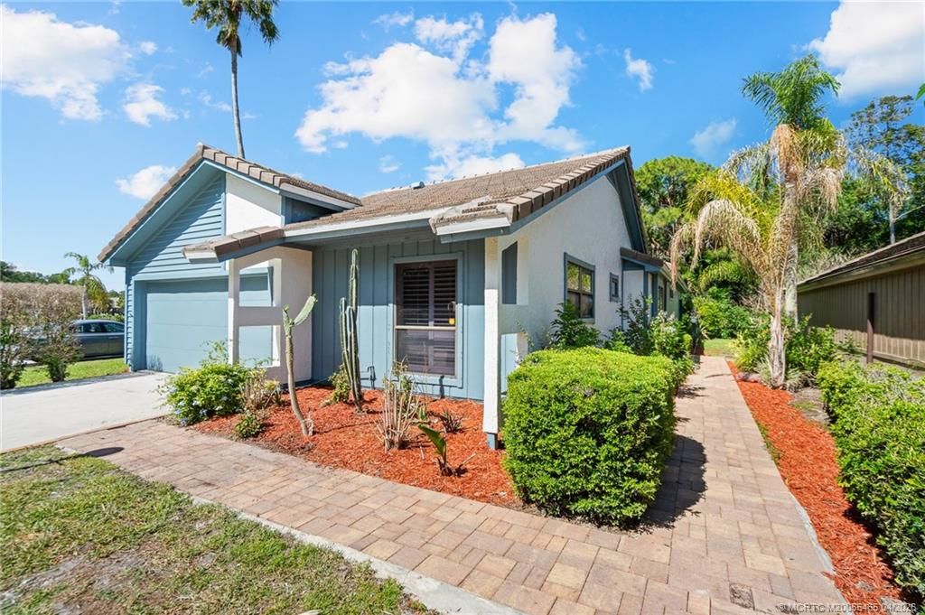 Photo of 4179 SW Mallard Creek Trail, Palm City, FL 34990 (MLS # M20055465)