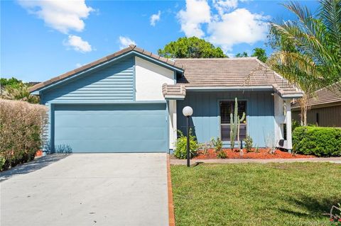 Photo of 4179 SW Mallard Creek Trail, Palm City, FL 34990 (MLS # M20055465)