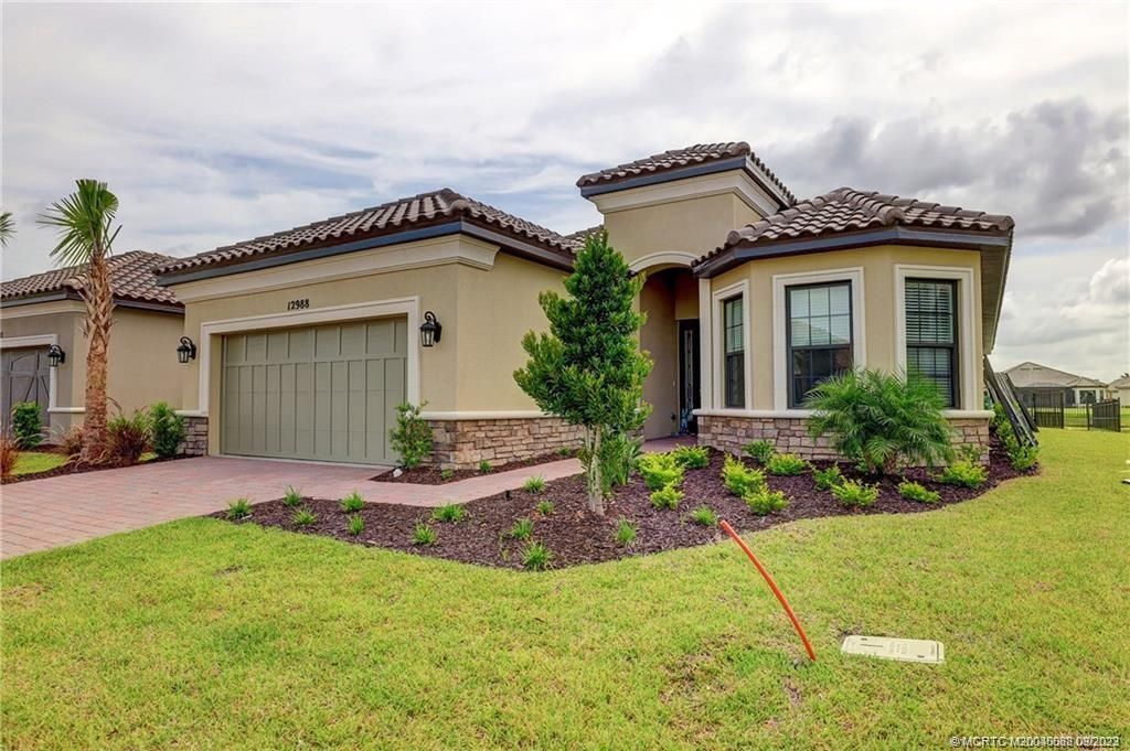 Photo of 12988 SW Ambra Street, Port Saint Lucie, FL 34987 (MLS # M20040088)