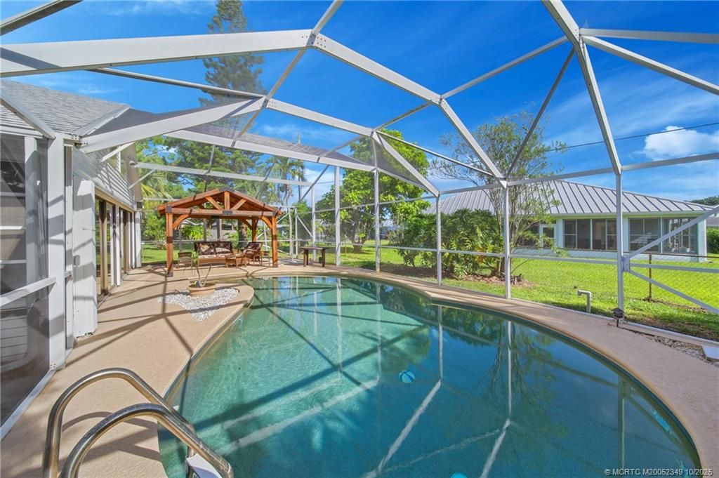 Photo of 1457 SE Santurce Road, Port Saint Lucie, FL 34952 (MLS # M20052349)