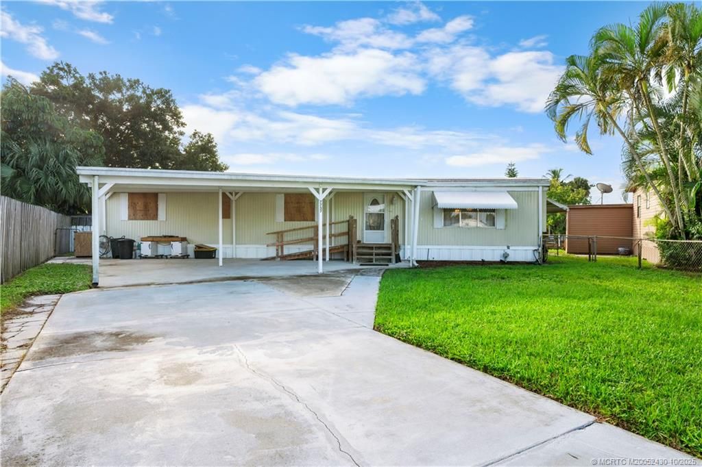 Photo of 7757 SE Fork Drive, Stuart, FL 34997 (MLS # M20052430)