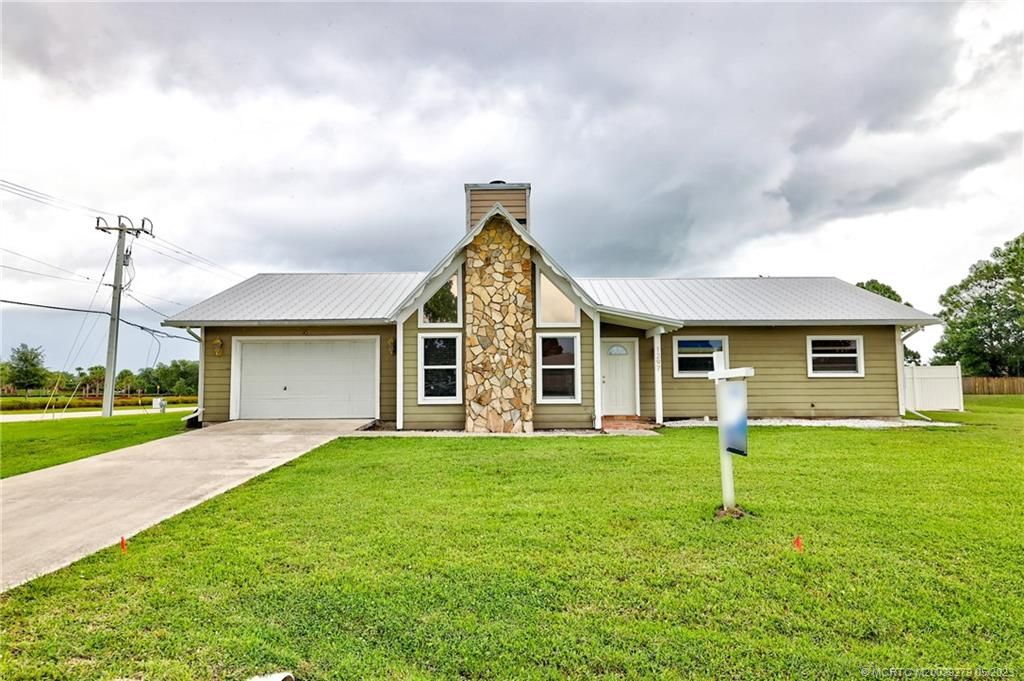Photo of 1297 SE Floresta Drive, Port Saint Lucie, FL 34983 (MLS # M20039279)
