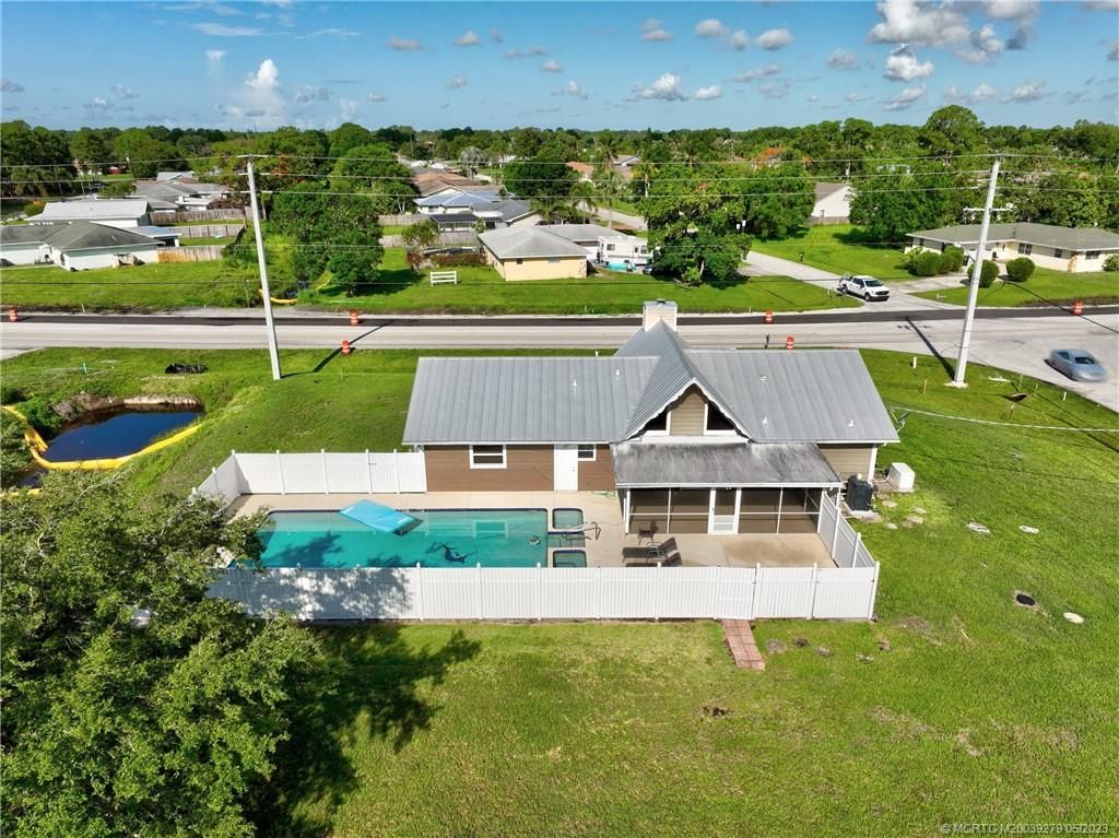 Photo of 1297 SE Floresta Drive, Port Saint Lucie, FL 34983 (MLS # M20039279)