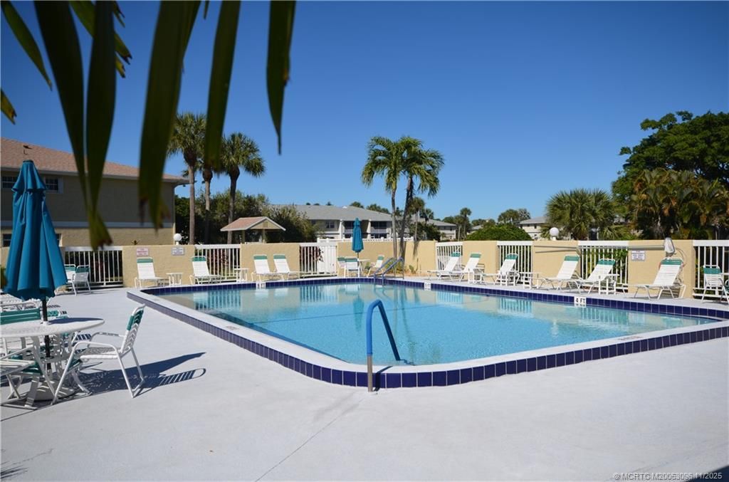 Photo of 1566 SE Royal Green Circle #101, Port Saint Lucie, FL 34952 (MLS # M20053096)